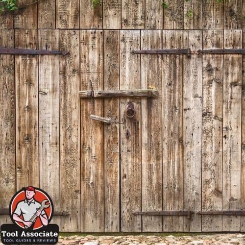 add more wood to a barn door to reduce the gap
